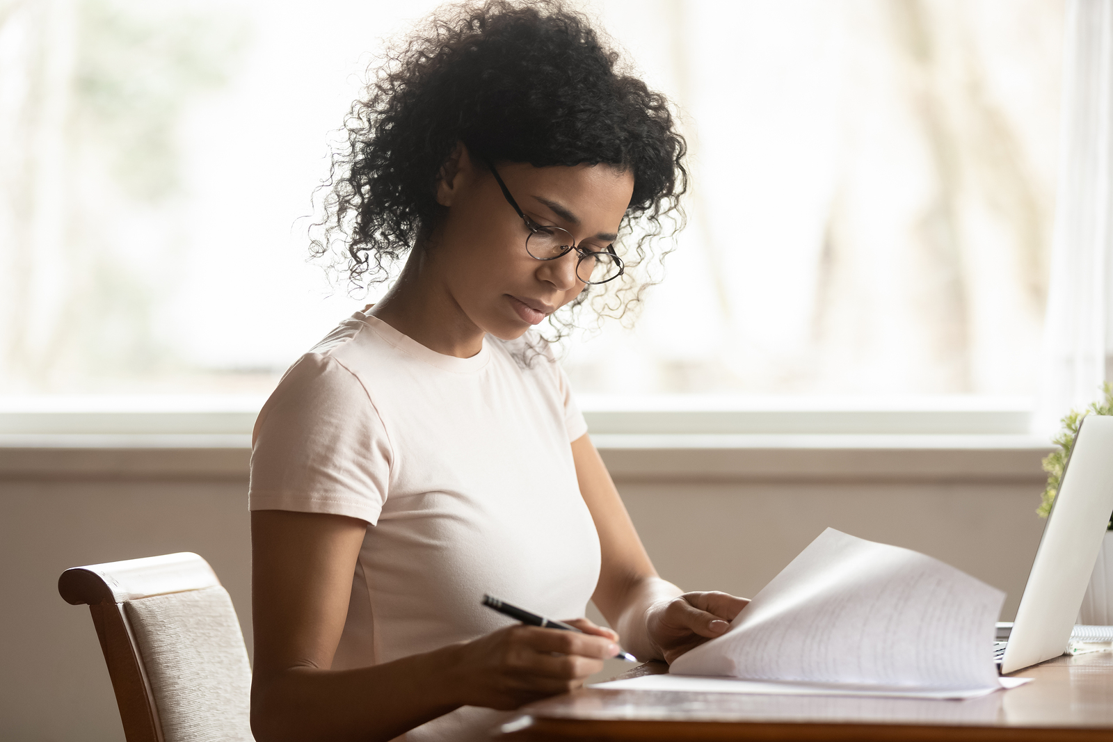 Focused Woman In Glasses Study Correct Paperwork